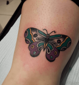 tatouage papillon vert
