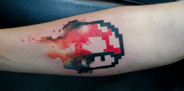 Tatouage Nintendo champignon pixel aquarelle