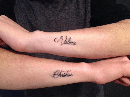 Tatouage prenom bras Valerie Christian Studio Lukys Tattoo Shop