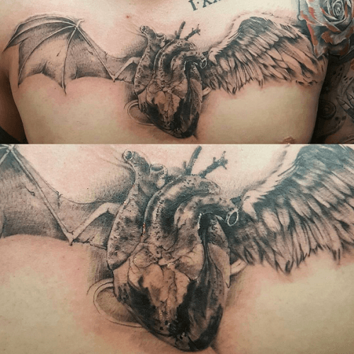 Tatouage chest ailes coeur anatomique ange demon