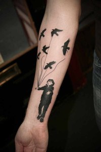 tatouage oiseaux avant bras