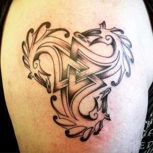 tatouage dragon triskel