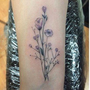 tatouage fleur fin