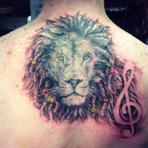 tatouage lion cicatrice