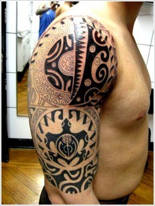 tatouage marquisien bras droit